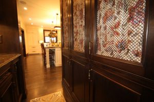 wooden closet doors with patterned fabric
